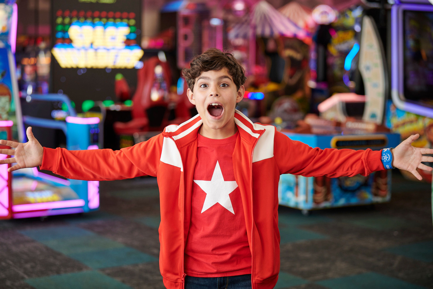 A kid in the gaming zone at Chuck E. Cheese fun centre