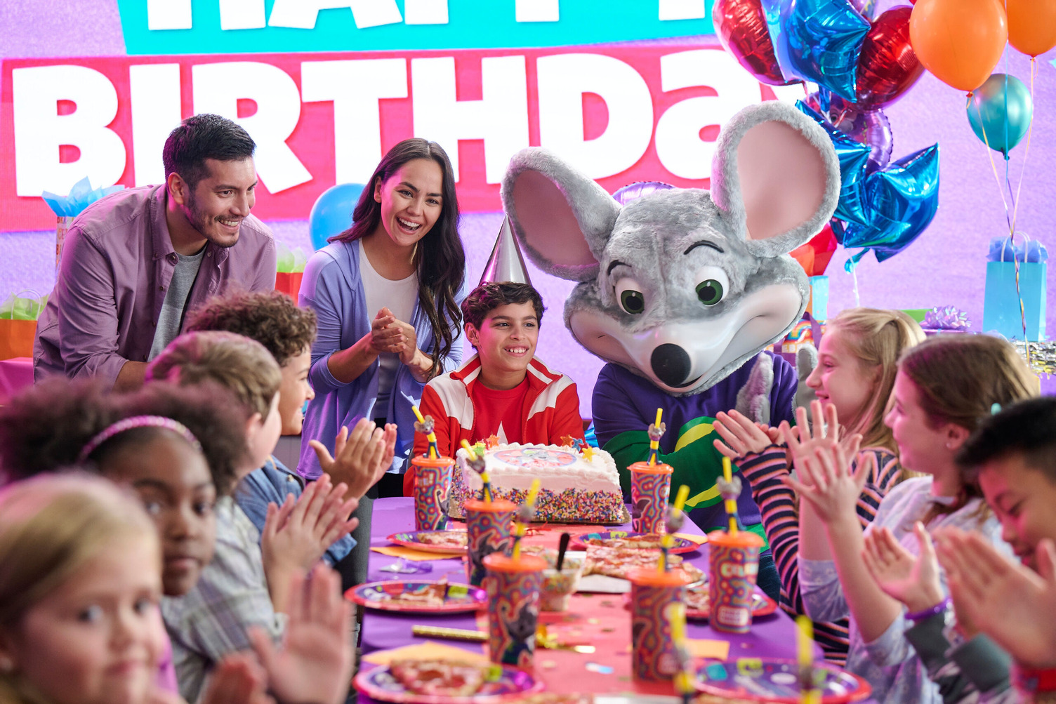 A kid having a birthday party at Chuck E. Cheese fun centre